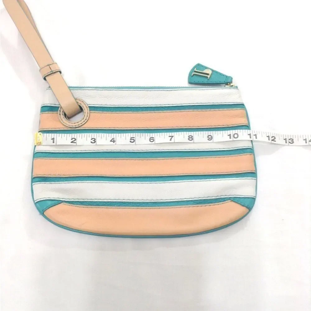 Anthropologie’s Pilcro and The Letterpress Leather Wristlet